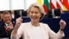 European Commission President Ursula von der Leyen, right, reacts after the announcement of the vote at the European Parliament in Strasbourg, eastern France, July 18, 2024. 