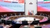 Negotiators and officials attend a meeting of defense ministers of Russia, Iran, Syria and Turkey in Moscow, Russia, April 25, 2023. 