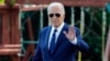 President Joe Biden waves to the media as he walks to board Marine One, July 15, 2024, on the South Lawn of the White House in Washington.