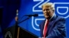 FILE - Former President Donald Trump speaks at the National Rifle Association annual convention in Indianapolis, Indiana, April 14, 2023. 