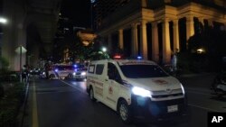 An ambulance sits outside the Grand Hyatt Erawan Hotel to Chulalongkorn hospital in Bangkok, Thailand, July 16, 2024.