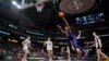LSU's Angel Reese shoots during the second half of the NCAA Women's Final Four championship basketball game against Iowa, April 2, 2023, in Dallas. 