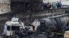 Au moins trois personnes ont été tuées et près de 300 autres blessées dans un gigantesque incendie lorsqu'un camion chargé de gaz a explosé près d'une installation gazière dans la capitale kenyane, peu avant minuit le 1er février. (Photo par LUIS TATO / AFP2)