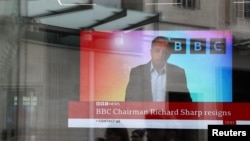 A screen inside BBC headquarters broadcasts a statement by Richard Sharp following his resignation, in London, Britain April 28, 2023.