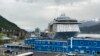 FILE - Cruise ships are docked on June 9, 2023, in downtown Juneau, Alaska. Voters in Alaska's capital city could decide in October whether to ban large cruise ships on Saturdays starting next year. 