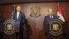 Syrian Foreign Minister Faisal Mekdad, right, speaks during a joint news conference with Iranian Foreign Minister Hossein Amirabdollahian in Damascus, Syria, March 9, 2023. 