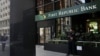 A security guard stands outside a First Republic Bank branch in San Francisco, California, April 28, 2023. 
