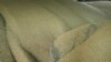 Grain lay at a grain port in Izmail, Ukraine, April 26, 2023. The European Commission said Friday it had reached a deal in principle to allow the transit of Ukrainian grain to resume through five European Union countries that had imposed restrictions.