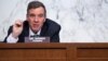 FILE - Senator Mark Warner, Democrat of Virginia and Chairman of the Senate Select Committee on Intelligence, holds a hearing n Capitol Hill in Washington, Apr. 14, 2021.