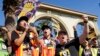 FILE - SAG-AFTRA leaders cheer for striking actors outside Paramount Pictures studio, in Los Angeles, Nov. 3, 2023. Hollywood's video game performers voted to go on strike July 25, 2024, throwing part of the entertainment industry into another work stoppage.