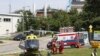 FILE - Rescuers transport an injured miner to an air ambulance near the Rydultowy coal mine near the city of Rybnik, in southern Poland, July 11, 2024. Officials say that a miner who was missing after an earthquake shook the mine has been found alive.