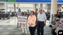 When he landed at the airport in North Charleston, South Carolina, on July 10, 2024, Shalom Korai was greeted with smiles and a sign that said "WELCOME SHALOM."