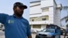 A police officer stands guard outside the office of Pakistan Tehreek-e-Insaf (PTI) party following police raid in office, in Islamabad, Pakistan, July 22, 2024. 