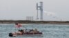 Spectators await the launch of SpaceX's Starship from the company's Boca Chica launchpad near Brownsville, Texas, April 17, 2023. The launch was delayed for at least 48 hours, due to a pressurization issue in a rocket booster
