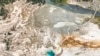 This aerial photo released by the National Park Service shows the damaged Biscuit Basin boardwalks after a hydrothermal explosion at Biscuit Basin in Yellowstone National Park, Wyo., July 23, 2024.