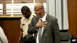 FILE - Christopher Dunn arrives in court, May 21, 2024, at the Carnahan Courthouse in St. Louis. The Missouri Supreme Court on July 24, 2024, blocked the release of Dunn, whose murder conviction was overturned earlier in the week.