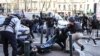 French police and demonstrators clash on the 11th day of protests after the government pushed a pension reform plan through parliament without a vote, in Toulouse, France, April 6, 2023.