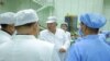 Pemimpin Korea Utara Kim Jong Un dan putrinya Kim Ju Ae sedang melakukan inspeksi pembangunan satelit miiliter pertama negara itu di Pyongyang, Korea Utara, 16 Mei 2023. (Foto: via Reuters)