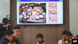 Thai police display pictures of evidence during a press conference at Lumpini police station in Bangkok, Thailand, July 17, 2024. 