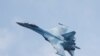 FILE - A Russian Sukhoi Su-35S jet fighter performs a flight during the Aviadarts competition, as part of the International Army Games 2021, at the Dubrovichi range outside Ryazan, Russia, August 27, 2021.