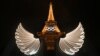 The Eiffel Tower is illuminated with wings in the foreground after the opening ceremony of the Paris 2024 Olympic Games, July 26, 2024. 