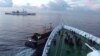 Foto dari video rekaman yang dirilis 22 Oktober 2023 ini menunjukkan tabrakan antara kapal Penjaga Pantai China (kanan) dengan kapal pengangkut pasokan Filipina (kiri) di Second Thomas Shoal, di Laut Cina Selatan yang disengketakan. (CCG via Kedutaan China di Manila/ AFP) 
