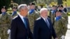 Brazilian President Luis Inacio Lula da Silva, right, and Portuguese President Marcelo Rebelo de Sousa review troops during a welcome ceremony in Lisbon, Portugal, April 22, 2023.