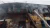 নারায়ণগঞ্জে গুদামে বিস্ফোরণের দেড় ঘণ্টা পর ফায়ার সার্ভিসের ছয়টি ইউনিট আগুন নিয়ন্ত্রণে আনে। শনিবার, ১৮ মার্চ, ২০২৩। 