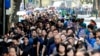 People line up to visit the national funeral house to pay respects to Vietnam's General Secretary of the Communist Party Nguyen Phu Trong in Hanoi, Vietnam, July 26, 2024. 