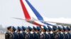 Chinese military officers stand in formation ahead of French President Emmanuel Macron's arrival at Beijing Capital International Airport, in Beijing, Apr. 5, 2023. 