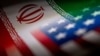 Bendera Iran dan AS dalam sebuah ilustrasi, 27 Januari 2022 ini. Korea Selatan, Senin (18/9), mengatakan bahwa pihaknya sedang bekerja sama dengan semua pihak yang terlibat pencairan dana Iran bernilai $6 miliar. (Foto: REUTERS/Dado Ruvic)