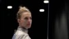 FILE - Olga Kharlan, of Ukraine, stands during the women's team sabre event against Uzbekistan at the Fencing World Championships in Milan, Italy, July 29, 2023. For Ukrainian competitors in Paris for the Olympics, joy goes hand in hand with sorrow. 