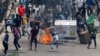 Anti-quota supporters clash with police and Awami League supporters at the Rampura area in Dhaka, Bangladesh, July 18, 2024.