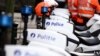 FILE - This photograph shows a Belgian police logo on police bikes during a protest near the headquarters of the Federal Police in Brussels, on Jan. 11, 2023. On March 29, seven people were charged over "possible terrorist attacks" in the country.