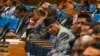 Nepal's Prime Minister Pushpa Kamal Dahal (C), looks on during a parliament session in Kathmandu on July 12, 2024.