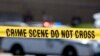 FILE - Crime tape blocks off a crime scene in Baltimore, Maryland, July 13, 2021. On July 5, 2024, a U.S. Marshal shot an armed man during an attempted carjacking in Washington, near the home of U.S. Supreme Court Justice Sonia Sotomayor.