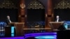 Presidential candidates Masoud Pezeshkian, left, and Saeed Jalili ​attend an election debate at a television studio in Tehran, Iran, July 2, 2024. (Morteza Fakhri Nezhad/IRIB/West Asia News Agency/Handout via Reuters)