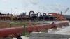 FILE - Oil pipelines, seen during the opening ceremony of Africa’s biggest oil refinery in Lagos, Nigeria, May 22, 2023. 