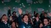 Taiwanese Vice President Lai Ching-te, also known as William Lai, left, celebrates his victory with running mate Bi-khim Hsiao, right, in Taipei, Taiwan, Jan. 13, 2024.
