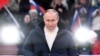 Presiden Rusia Vladimir Putin menyampaikan pidato peringatan delapan tahun aneksasi Krimea oleh Rusia di Stadion Luzhniki di Moskow, Rusia, 18 Maret 2022. (Foto: Sputnik/Sergey Guneev/Kremlin via REUTERS)