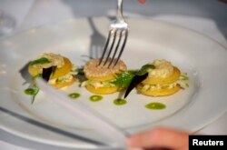 Ilustrasi: Hidangan dengan telur siput di restoran Escargot Montorgeuil, Paris, 19 Desember 2007.