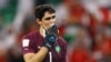 Yassine Bounou dari Maroko merayakan kemenangan adu penalti saat Maroko maju ke perempat final. (Foto: REUTERS/Matthew Childs)