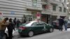 FILE - People gather outside of the Azerbaijan Embassy after an attack there in Tehran, Iran, Jan. 27, 2023.