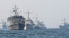 From left, Norwegian support vessel Valkyrien, Estonian mine-hunter Admiral Cowen, Dutch mine-hunter Makkum, Norwegian minesweeper Otra and Belgian mine-hunter Belis form a convoy during a NATO deployment in the Baltic Sea along the German Coast, April 22, 2014.
