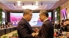 Menteri Luar Negeri Korea Selatan Park Jin berbicara dengan Kepala Kebijakan Luar Negeri Partai Komunis China Wang Yi sebelum Pertemuan Menteri Luar Negeri ASEAN Plus Tiga di Jakarta, 13 Juli 2023. (Foto: MAST IRHAM/Pool via REUTERS)