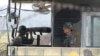 South Korean soldiers stand watch at a checkpoint in Paju, near the border with North Korea, in the wake of rocket and missile firings by Pyongyang into waters off the nation's east coast, Sept. 6, 2014.