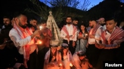 የያዚዲ ማሕበረሰብ አባላት አዲስ ዓመታቸውን ሲያከብሩ (ፎቶ ፋይል ሮይተርስ ሚያዚያ 19፣ 2023)