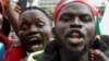 People react during a concert in memory of people who were killed during a demonstration against the imposition of tax hikes, in Nairobi, Kenya, July 7, 2024. The deadly protests led President William Ruto to reject the increases.