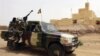 FILE - Malian soldiers patrol in Kidal, northern Mali, July 29, 2013. Mali's army and Russian mercenaries are accused of killing civilians during a military operation in June 2024 in the Kidal region. The Malian military says it has no knowledge of the alleged killings.