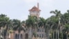 陪审团裁定中国女子擅自闯入海湖庄园罪名不成立
